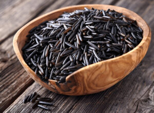 A bowl of wild rice, a protein-rich and gluten-free grain.